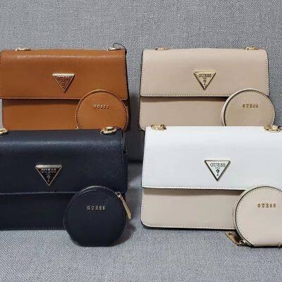 GUESS new European and American retro all-match solid color flip top inverted triangle mother-in-law bag small square bag one-shoulder messenger bag