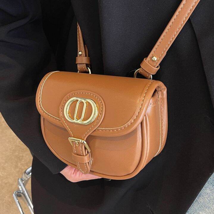 spring-popular-small-bag-female-ins-senior-feeling-inclined-shoulder-bag-2022-new-tide-western-style-restoring-ancient-ways-one-shoulder-saddle-bag