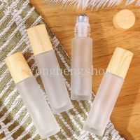 445/10ml ขวดน้ำมันหอมระเหยพร้อมลูกกลิ้งแก้วลายไม้ฝาครอบรีฟิลขวดน้ำมันหอมระเหยแบบพกพาขวดน้ำหอมม้วนบนขวดคอนเทนเนอร์