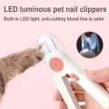 กรรไกรตัดเล็บแมว กรรไกรตัดเล็บสุนัข มีไฟ LED และตะไบเหล็กซ่อน ป้องกันเลือดออก ที่ตัดเล็บสัตว์เลี้ยง. 