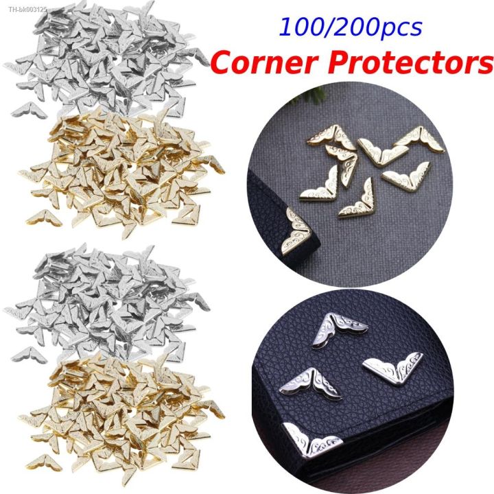 100pcs-tone-scrapbooking-albums-corner-protectors-card-file-menu-metal-book-laptop-corner-protector-scrapbooksphoto-albums