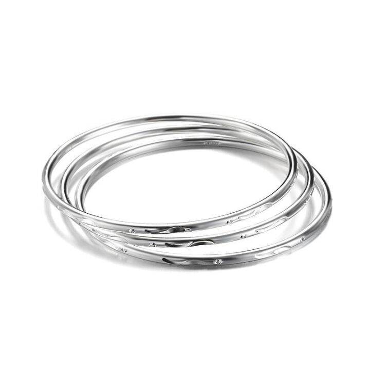 smooth-999-sterling-silver-bracelet-ring-of-carve-patterns-or-designs-on-woodwork-held-a-minimalist-wind-gift-to-send-his-girlfriend-young-mother