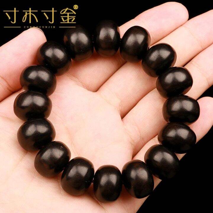 ใหม่มาถึงสีดำสร้อยข้อมือลูกปัดพุทราไม้จันทน์สีม่วงลูกคิดไม้จันทน์ลูกปัดวัสดุเก่าจมอยู่ใต้น้ำพื้นบ้านลูกปัดผู้ชายและผู้หญิงของสร้อยข้อมือ