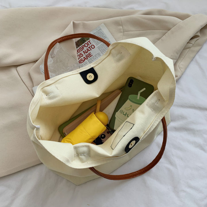 กระเป๋าถือโท้ทกระเป๋าผ้าใบสะพายไหล่ลำลองนักเรียนเรียบง่ายของผู้หญิงความจุขนาดใหญ่