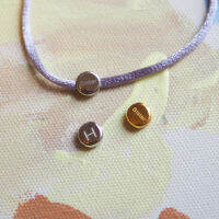 Round Bead; Word engrave with nylon rope