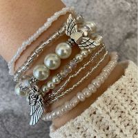 2022 New best selling love pearl wings rice beads beads bracelet 7 sets of women 39;s jewelry wholesale anime love bracelet