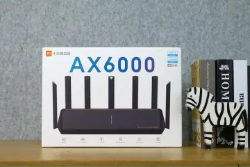 Unboxing and components of the Xiaomi Mesh System AX3000, which