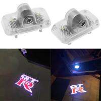 ไฟ LED 2ชิ้นสำหรับประตูรถยนต์หลอดไฟฉายโลโก้โปรเจคเตอร์สำหรับ Nissan GTR R35 R34อุปกรณ์ไฟเตือนการต้อนรับ