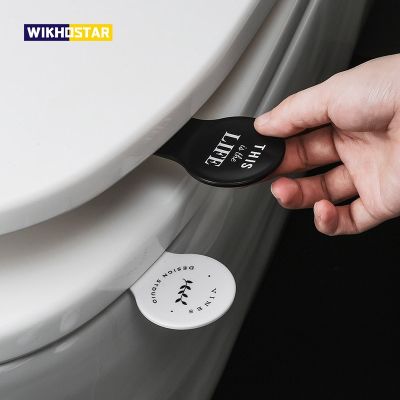 WIKHOSTAR 1 Pcs Nordic Toilet Seat Cover Lifter Self Adhesive Sanitary Closestool Cover Lift Handle Bathroom Accessories