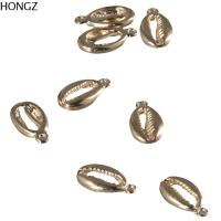 HONGZ 20pcs ทองเหลืองเบิ้ล เครื่องรางรูปเปลือกหอยทะเล รูปเปลือกหอยทะเล ธีมทะเล เครื่องรางชุบทอง เปลือกหอยรูปสัตว์ทะเลที่มีเสน่ห์ เครื่องรางรูปเปลือกหอย เครื่องประดับทำเองจำนวนมาก