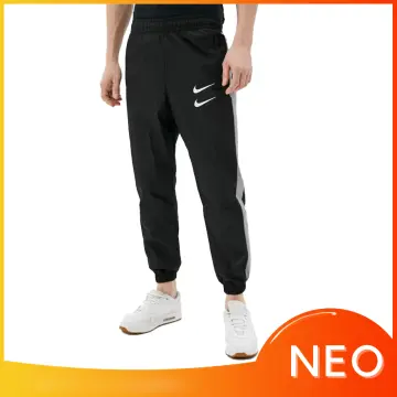 Nike Sportswear Men's Unlined Cuff Trousers. Nike VN