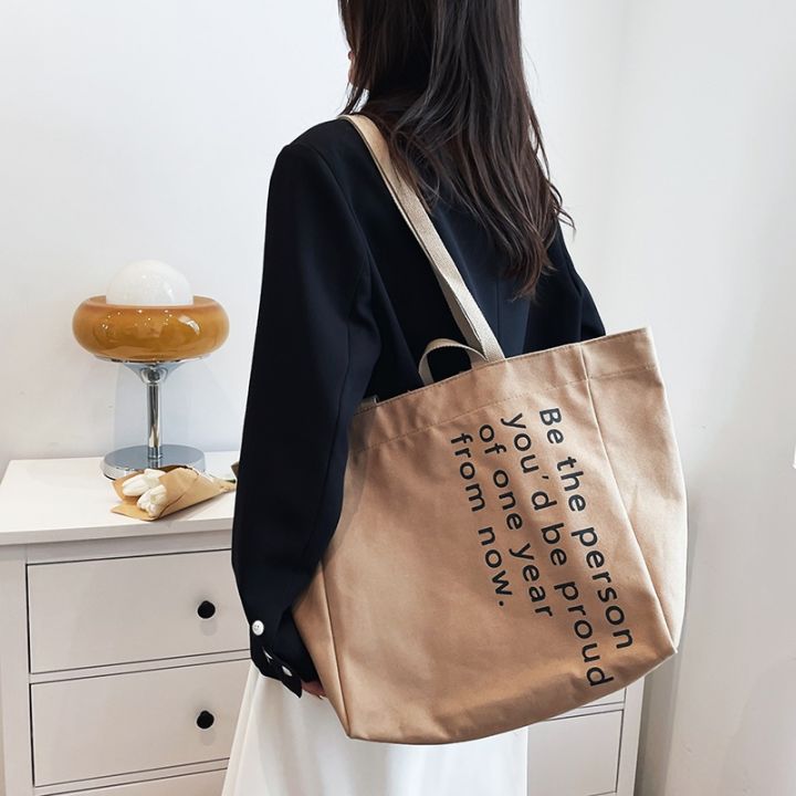 koreafashionshop-kr1810-กระเป๋าผ้าแคนวาสใบใหญ่-be-the-person-มี4สาย-สะพายข้าง-ถือ