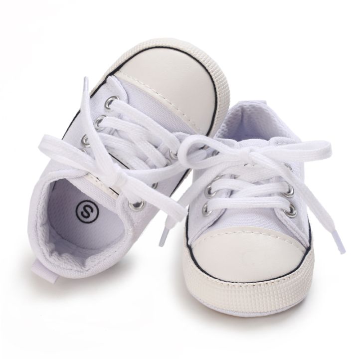 รองเท้าใส่เดินแฟชั่นคลาสสิกพื้นนุ่มป้องกันการลื่นเรียบง่ายสำหรับเด็กทารกอายุ0-12เดือน