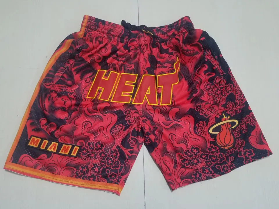 Men's Mitchell & Ness Red Miami Heat Hardwood Classics Lunar New Year Swingman  Shorts