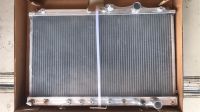 หม้อน้ำรถยนต์ อลูมีเนียมทั้งใบ มิตซูบิชิ อีคาร์ 1.5 เกียรออโต้ All Aluminium Radiator Mitsubishi Lancer E-car 1.5 AT ปี 1992-1996