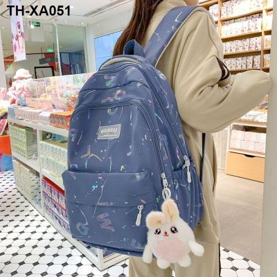The new 2023 high quality bag male school students is female graffiti reflective computer backpack joker