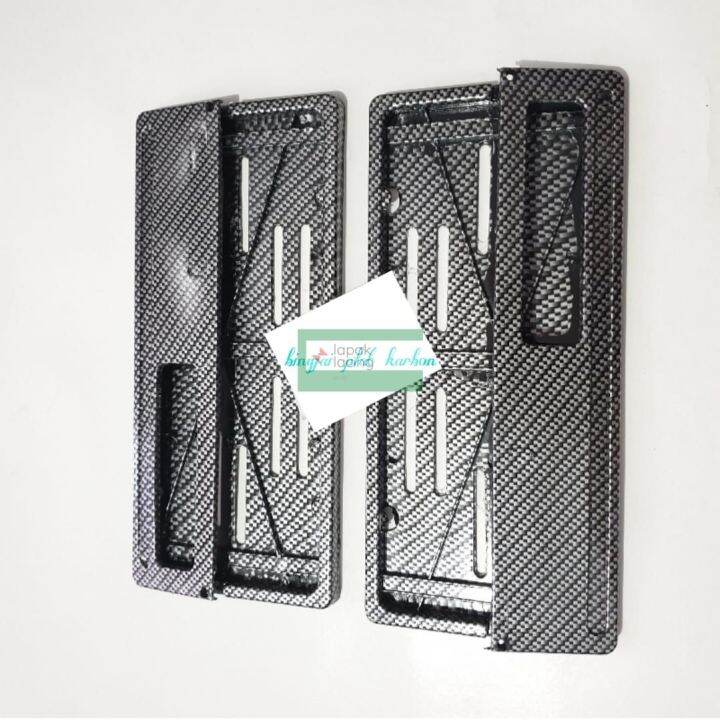 Merestorasi Gaya: Modifikasi Aksesoris Mobil Rush 2018 Plat Nomor Carbon