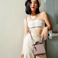 Prism crossbody bag - กระเป๋าสะพายหนังเทียม  สีกะปิ  THEOREM