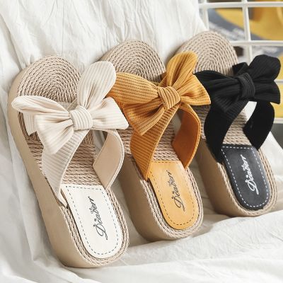 new bow slippers imitation straw hemp base outside the female sandals to a word procrastinates high-heeled wedge beach fashion