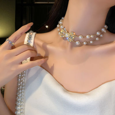 การออกแบบสร้อยคอมุกกุทัณฑ์ความรู้สึกเฉพาะโซ่กระดูกไหปลาร้าบุคลิกภาพBowknot pearl necklace design sense niche personality clavicle chain