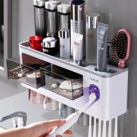 GURET New Magnetic Toothbrush Holder For Bathroom Accessories Automatic Toothpaste Squeezer Dispenser Wall Mounted Storage Rack