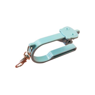 【สินค้าใหม่】เครื่องมือที่แกะหัวเข็มขัดเบาะรถพร้อมพวงกุญแจสำหรับเด็กอุ้งเท้าสุนัขเบาะ