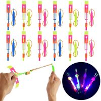 10PCS Outdoor Slingshot Toys Shining Rocket Flash LED Light Night Kids Shine Slingshot Elastic Helicopter Rotating Toy