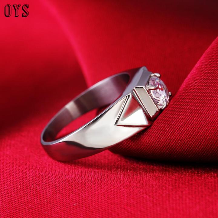 แหวนแต่งงานแหวนเพชรสังเคราะห์เหล็กไทเทเนียมแฟชั่นผู้ชายแบบเรียบง่าย