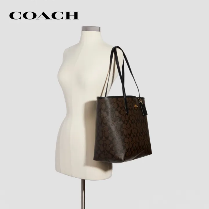 coach-กระเป๋าทรงสี่เหลี่ยมผู้หญิงรุ่น-city-tote-in-signature-canvas-สีน้ำตาล-5696-imaa8