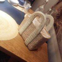 M.L2019 new autumn and winter homemade heavy-duty woven cross-body portable pearl straw bag Bali holiday womens bag 【JYUE】