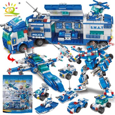 🧡HUIQIBAO รถบรรทุกสำหรับเด็ก,กองบัญชาการตำรวจ8In1รถหุ่นยนต์ตำรวจบล็อกตัวต่อโมเดลเฮลิคอปเตอร์อิฐของเล่นสำหรับเด็ก700ชิ้น
