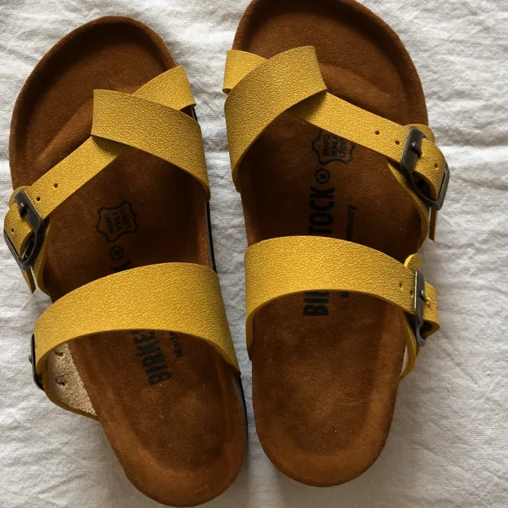 mustard colored birkenstocks