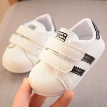 White soft bottom deals baby shoes