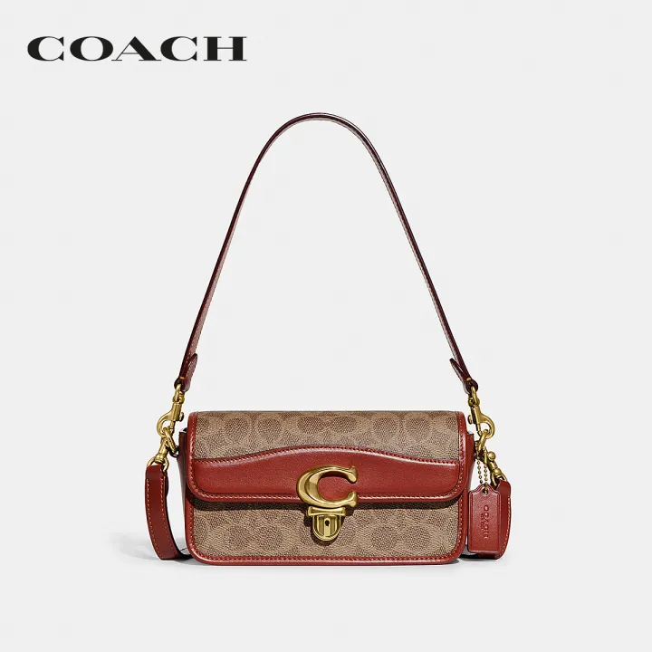 coach-กระเป๋าสะพายข้างผู้หญิงรุ่น-studio-baguette-bag-in-signature-canvas-สีครีม-ce764-b4nq4