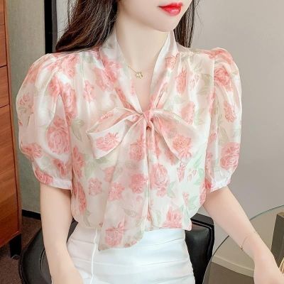 เสื้อผู้หญิง2022ฤดูร้อนใหม่โบว์ดอกไม้เสื้อผู้หญิงสไตล์เกาหลีแฟชั่นหลวมชีฟองแขนสั้นด้านบน