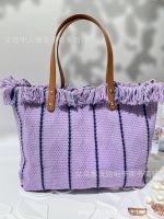 DT กระเป๋าชายหาดกระเป๋าเดินทางใบใหญ่แฟชั่น Simple Tassel Mommy Bag Womens Bag กระเป๋าสะพายยุโรปและอเมริกาลายใหญ่