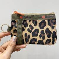 LeSportsac22 tide car key driving license small bread female mini parcel headphones certificate package 2437 leopard grain