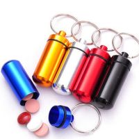 【LZ】 Portable Mini Travel Pill Medicine Box Case Waterproof Container Keychain Capsule Bottle Key Ring Chain First Aid Medicine Box