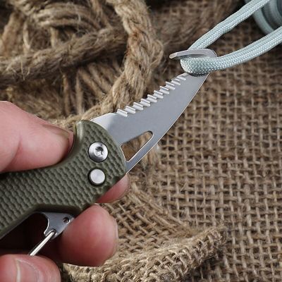 ；。‘【； Portable Multiftional Tool  Foldable Serrated Sharp Express Parcel  Keychain With Hook Cut Rope Survival Tool