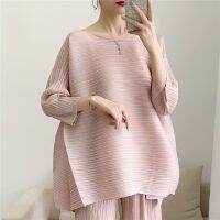 2023 Hot Miyake pleated fashion suit womens new loose belly-covering T-shirt slimming wide-leg nine-point pants two-piece set