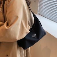 Casual niche design bag 2023 new bag womens nylon cloth crossbody bag popular hot style single shoulder armpit bag 【JYUE】