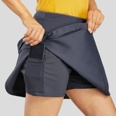 QUECHUA กางเกงกระโปรงผู้หญิงสำหรับใส่เดินในเส้นทางธรรมชาติ กางเกงกระโปรงเดินป่า กางเกงมีกระเป๋า 2 ช่อง ผ้ายืดสวมใส่สบาย