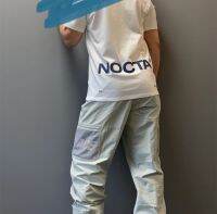 ♨Nocta Joint Drake เสื้อยืดสลิมแขนแขนสั้นคอกลมโลโก้ขนาดเล็กแบบอเมริกันระบายอากาศผ้าฝ้ายพิมพ์ตัวอักษร