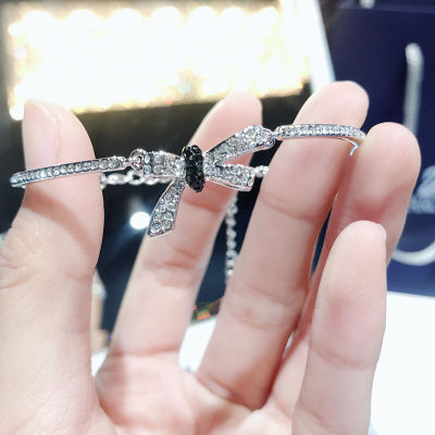 Original แท้จริง Swarovski ผู้หญิงที่มีเสน่ห์โรแมนติก MADEMOISELLE โบว์สร้อยข้อมือผู้หญิงแฟชั่นละเอียดอ่อน