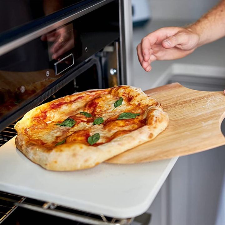 wooden-pizza-board-round-with-hand-pizza-baking-tray-pizza-stone-cutting-board-platter-pizza-cake-paragraph