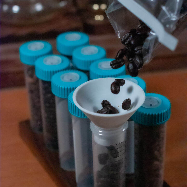 Coffee bean centrifuge tube base with funnel coffee storage tank