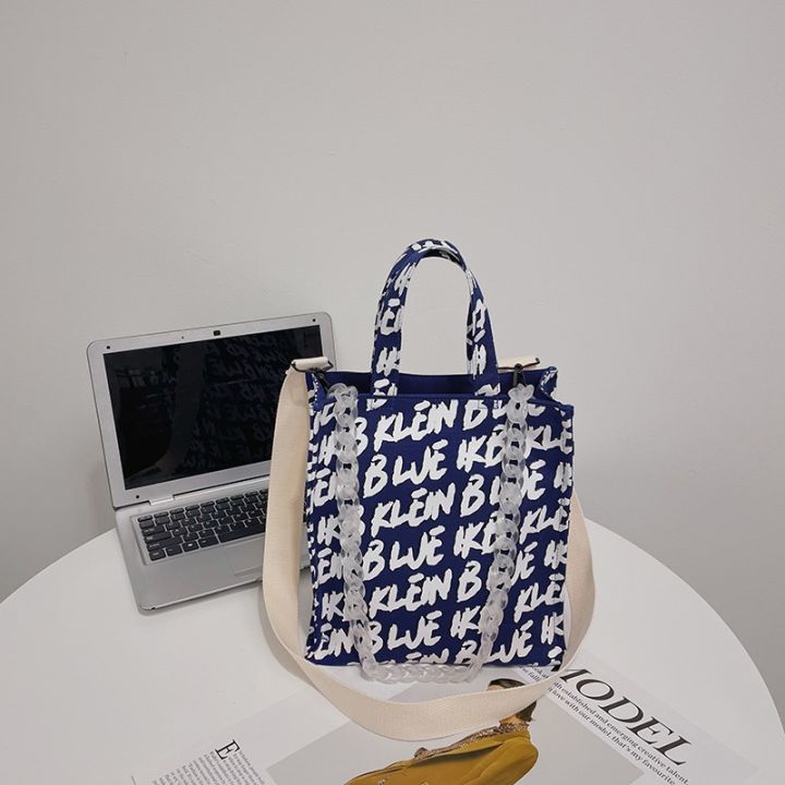 cross-border-new-klein-blue-one-shoulder-his-canvas-bag-female-western-style-letters-printing-large-capacity-hand-held-tote-bags