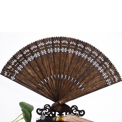 ﹊☢  Vietnam nha trang 5 a-class aloes folding fan high oil and grease black old material hollow out fan retro crafts are quality goods