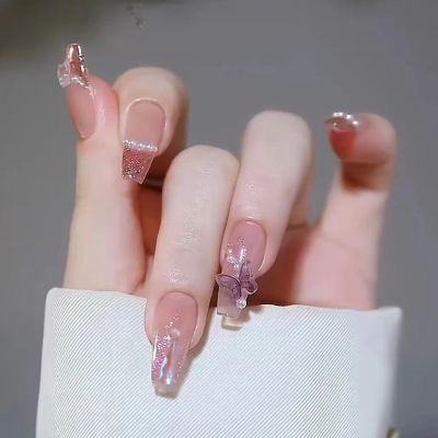 [COD] Early autumn showing white diamond style wearing armor three-dimensional butterfly powder through flashing ins long fake nails wholesale pieces