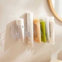 Wall Mounted Toothpaste Holder Bathroom Toiletries Storage Rack Mirror Cabinet Hand Cream Hanging Rack Facial Cleanser Storage
